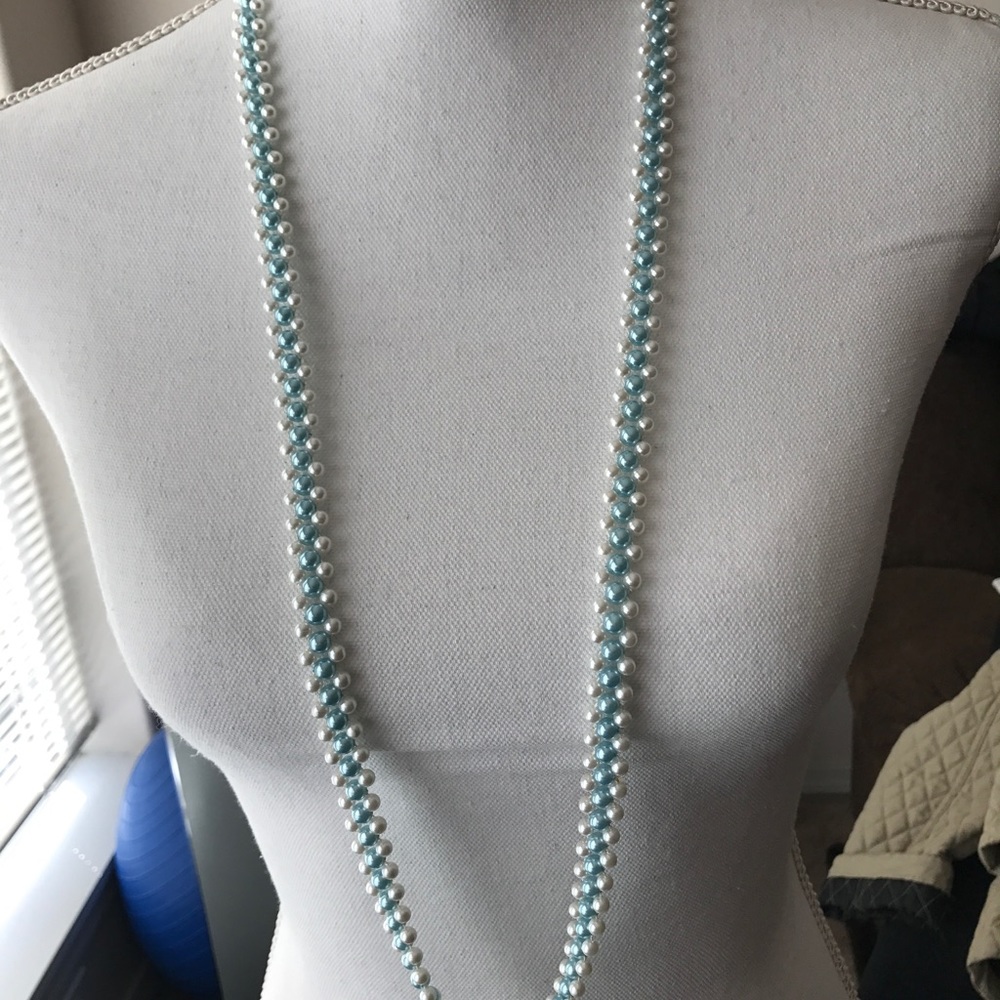Triple strand blue and white pearl beaded necklace